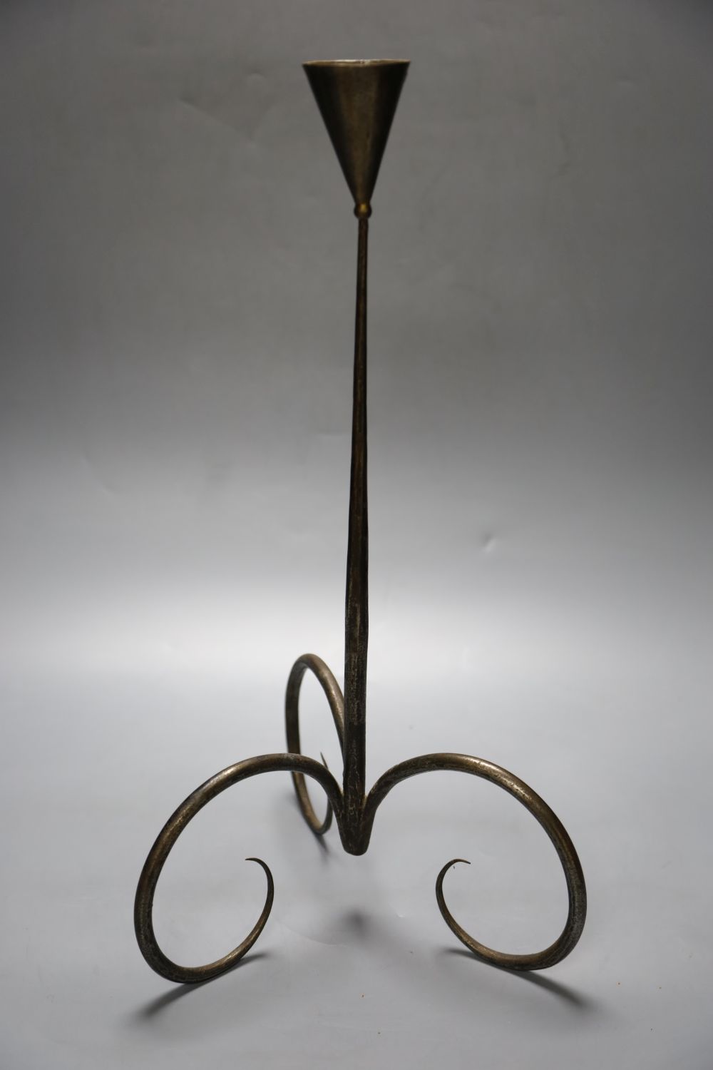 A wrought iron pricket candlestick, by Sean Black, 48cm